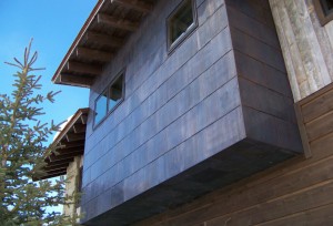 Finishes change the character of steel cladding, as exemplified by this oxidized treatment by Teton Heritage Builders. PHOTO Courtesy of Teton Heritage Builders. 
