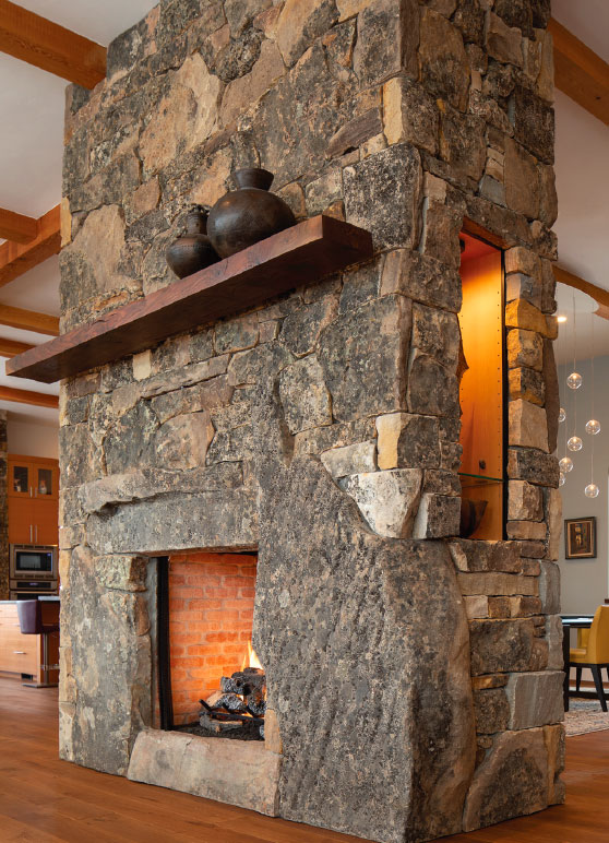 Sophistication & Comfort Share the Same Hearth in an Old Stone Modern- Bend Fireplace 